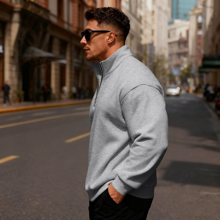 Herren sportlicher Pullover mit Stehkragen und halbem Reißverschluss Echoarchiv