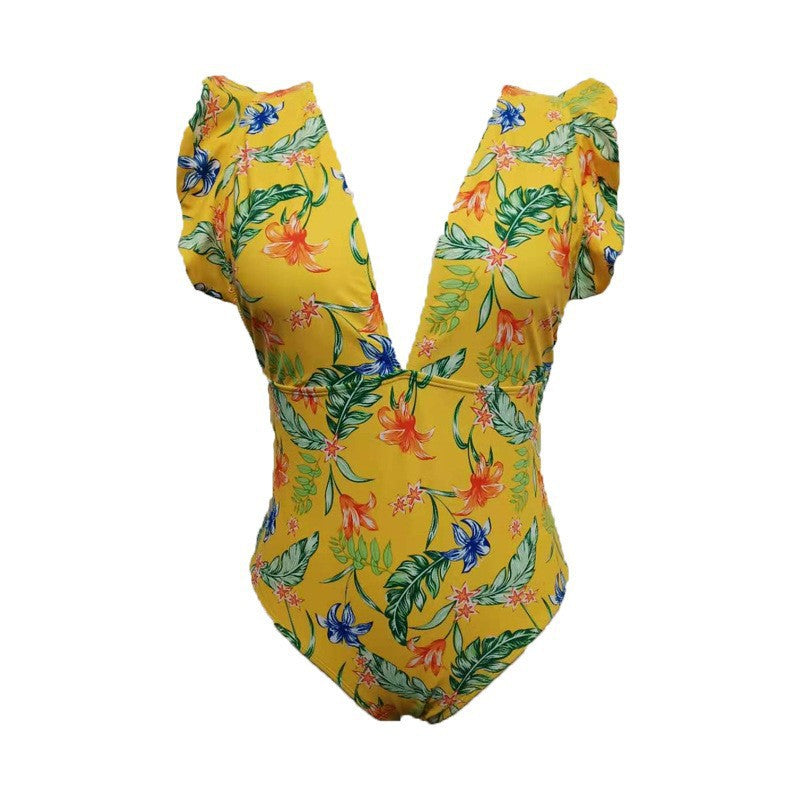 Damen Eleganter Einteiler Badeanzug mit Blumenmuster und voluminösen Ärmeln Echo Archiv