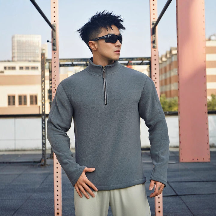 Herren Fleece-Pullover mit modernem Stehkragen und attraktiven Reißverschlussdetails Echoarchiv