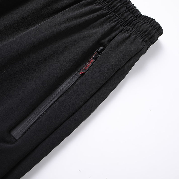 Herren Funktionale Jogginghose mit elastischem Bund und Seitentaschen Echo Archiv