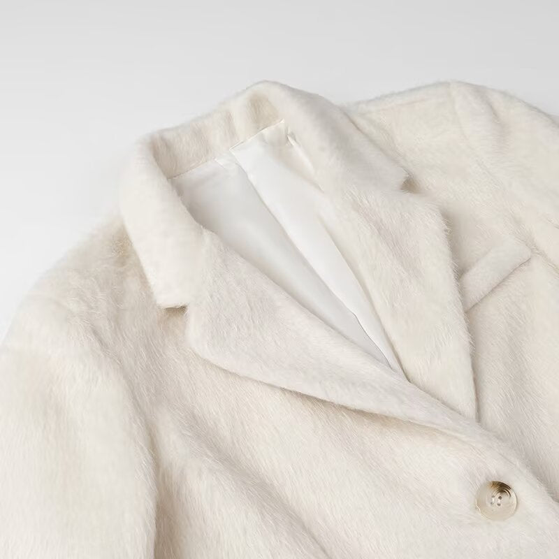 Damen nan minimalistischer midilanger Mantelblazer mit strukturierter Oberfläche, Reverskragen und Pattentaschen Echo Archiv