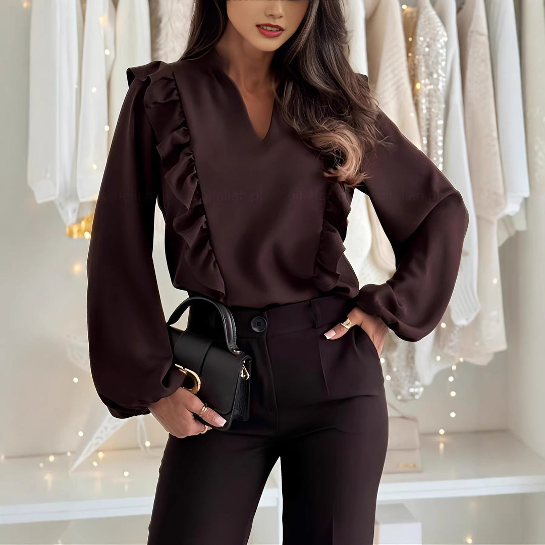 Damen elegant geschnittene Bluse mit Rüschendetails und V-Ausschnitt Echo Archiv