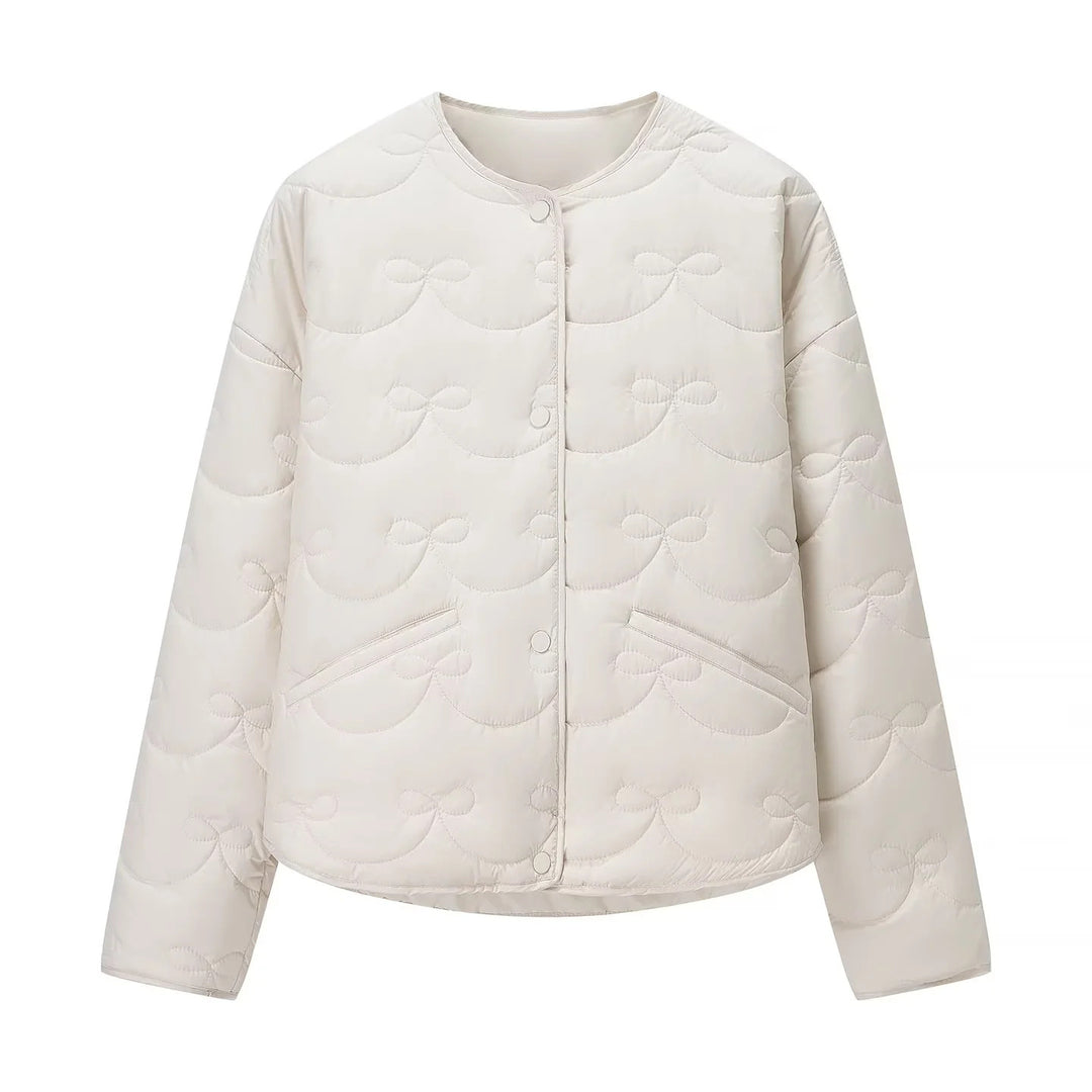 Damen leichte Steppjacke im Rundhalsdesign mit Schleifensteppung und verdeckter Druckknopfleiste – Célinea