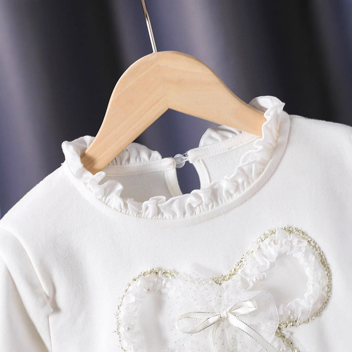 Damen Langarmshirt mit verspieltem Rüschendesign und dekorativem Blumenmotiv Echo Archiv