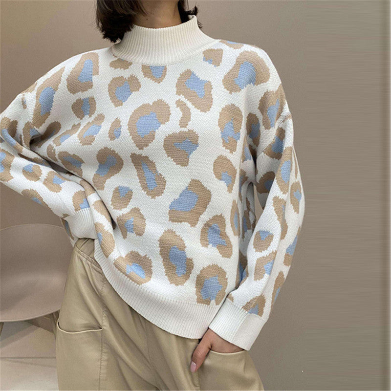 Damen Oversize Rollkragenpullover mit Leo-Jacquard und Rippbündchen Echoarchiv