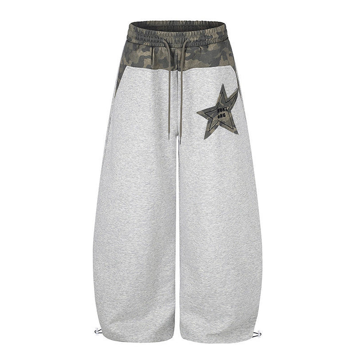 Damen Extraweite Culotte-Sweatpants mit Camouflage-Bund und Sternpatch Echoarchiv