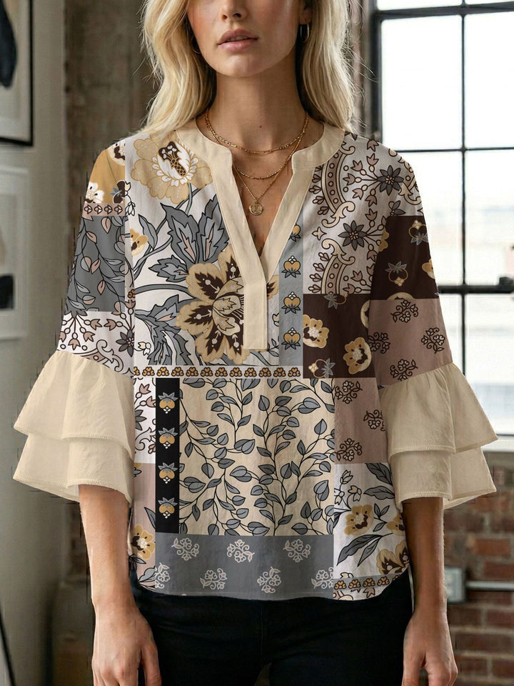 Damen Blusenshirt mit voluminösen Ärmeln und kreativem Druckdesign Echo Archiv