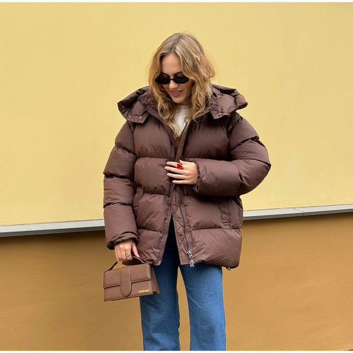 Damen Gefütterte Oversize-Steppjacke mit Volumenärmeln und abnehmbarem Kapuzenkragen Echo Archiv