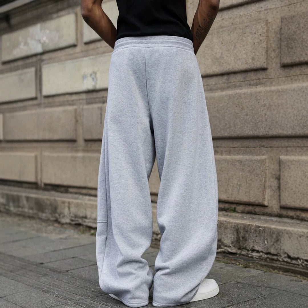 Herren weite Sweatpants im Baggy Cut mit elastischem Bund, Tunnelzug und Eingrifftaschen Echo Archiv