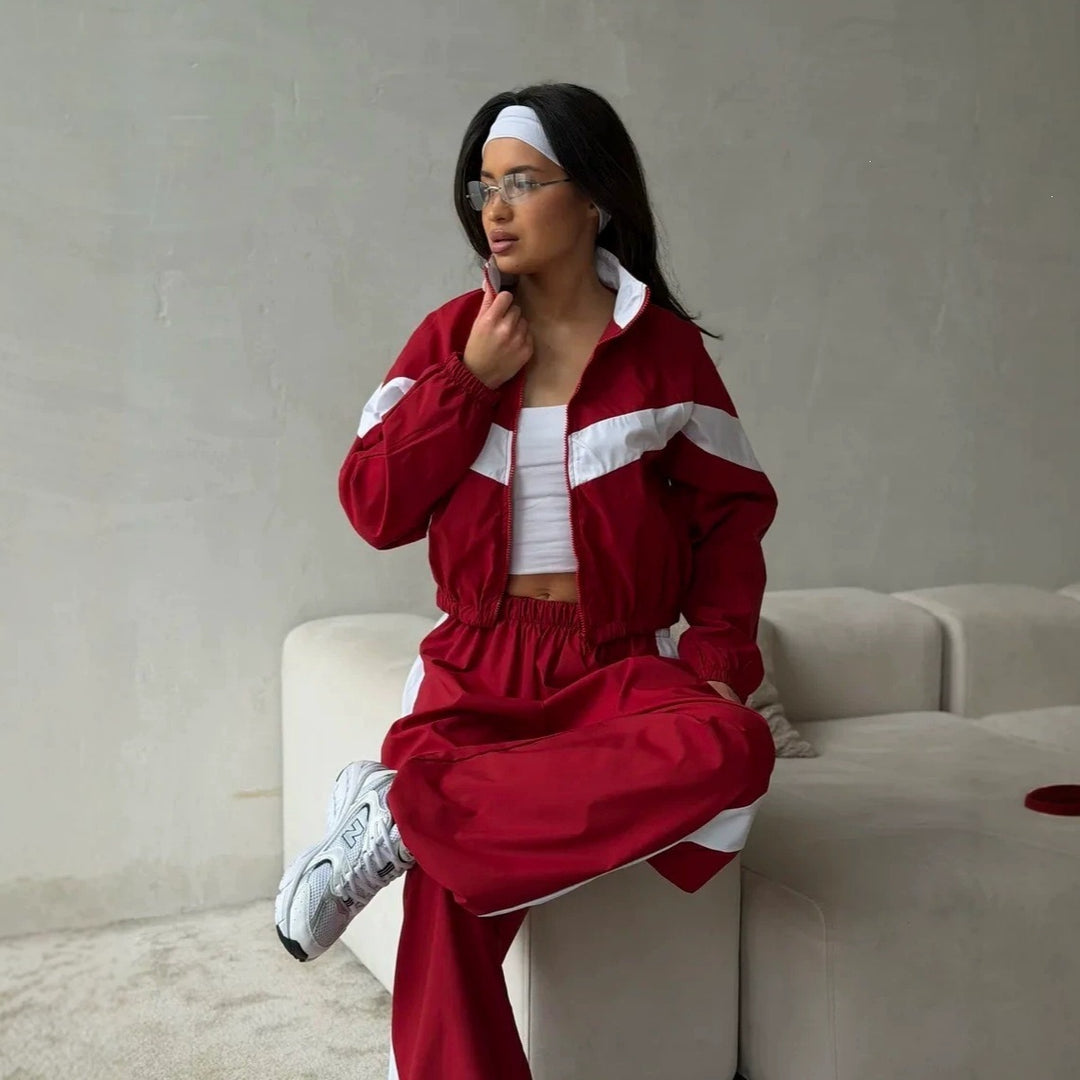 Damen Zweiteiliges Track-Set mit Cropped-Windjacke und weitem Jogger Echoarchiv