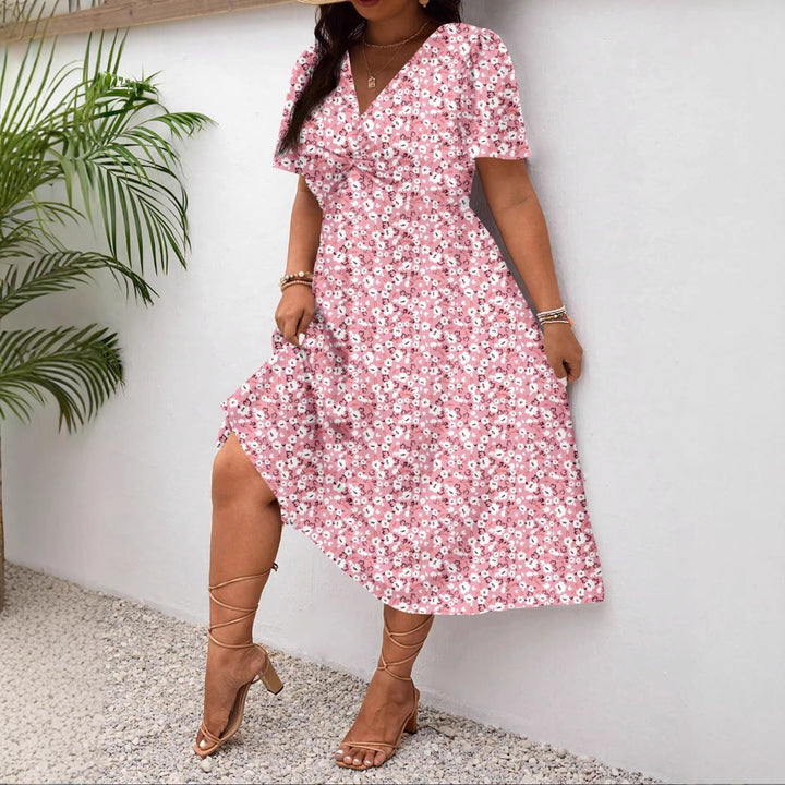 Damen Midi-Kleid mit Blumenmuster und vorteilhaftem Schlitz Echo Archiv