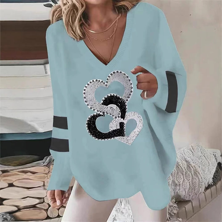 Damen nan übergroßer Strickpullover mit tiefem Ausschnitt Paillettenherz und Kontrastarmstreifen Echo Archiv
