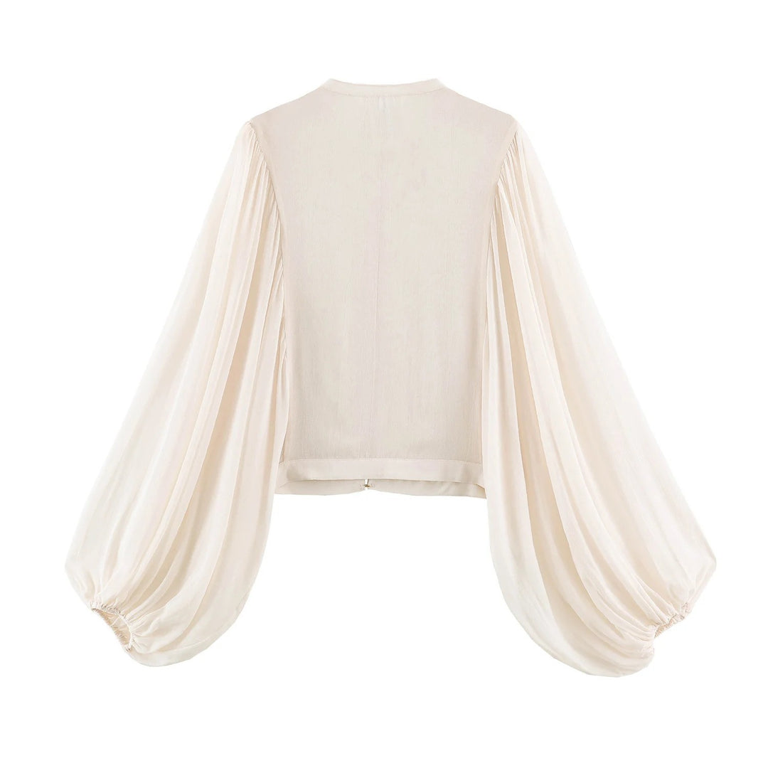 Damen Kurze Bluse‑Jacke mit dekorativer Kordelverzierung und voluminösen Plisseeärmeln Echo Archiv