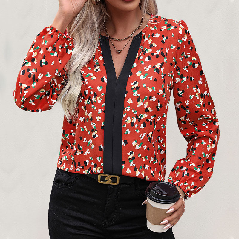 Damen Modische Bluse mit V-Ausschnitt und floralem Muster Echo Archiv