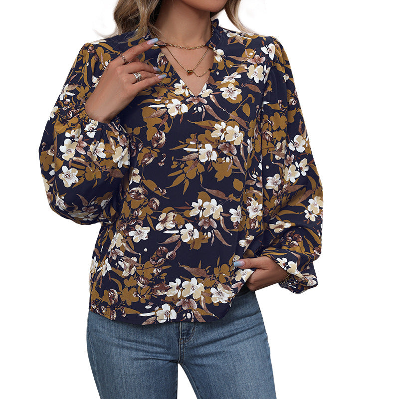 Damen Leichte Chiffonbluse mit floralem Alloverprint, V-Ausschnitt und voluminösen Bündelärmeln Echoarchiv