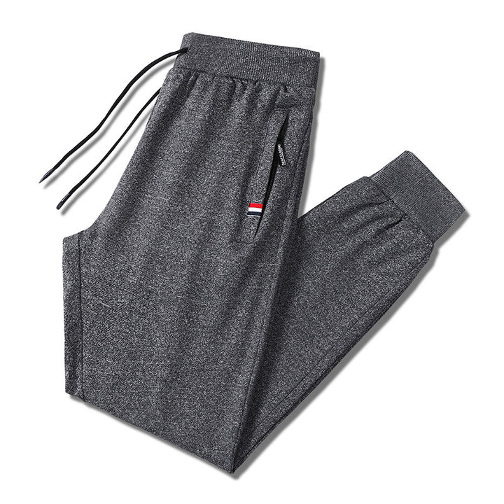 Herren Slim-Fit Jogginghose mit elastischem Rippbund, Kordelzug und Reißverschlusstaschen Echo Archiv