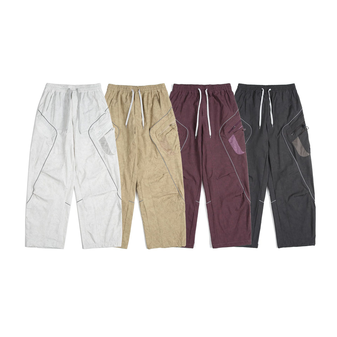 Unisex Cargo-Culotte-Hose mit elastischem Bund, Reißverschlusstaschen und Mesh‑Einsätzen Echoarchiv