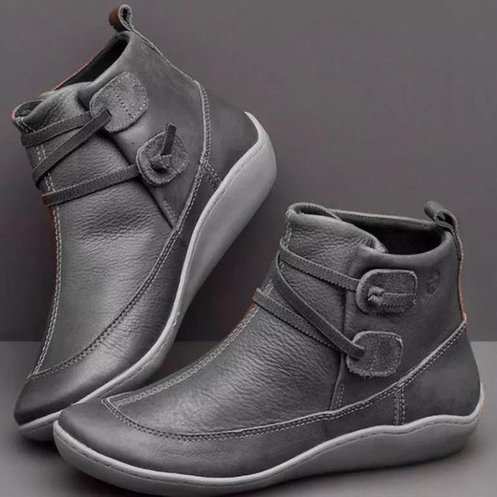 Damen nan knöchelhohe Softleder-Slipperstiefelette mit Schlaufen-Wickelriemen und ergonomischer Gummilaufsohle Echo Archiv