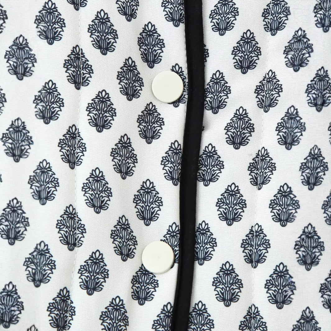 Damen gesteppte Kurzjacke mit Rundhalsausschnitt, Druckknöpfen und Kontrastpaspel – Célinea