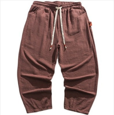 Herren Lässige weite Hose aus atmungsaktivem Stoff mit elastischem Bund und seitlichen Taschen Echoarchiv