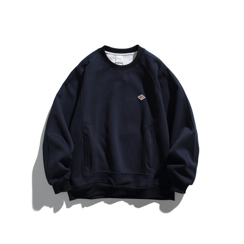 Unisex Oversize-Sweatshirt aus French-Terry mit Raglanärmeln, verdeckten Eingrifftaschen und kleinem Logopatch Echoarchiv