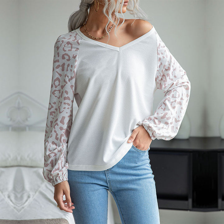 Damen Feinstrick-V‑Neck-Shirt mit Waffelstruktur und Chiffon-Leopardenärmeln Echoarchiv