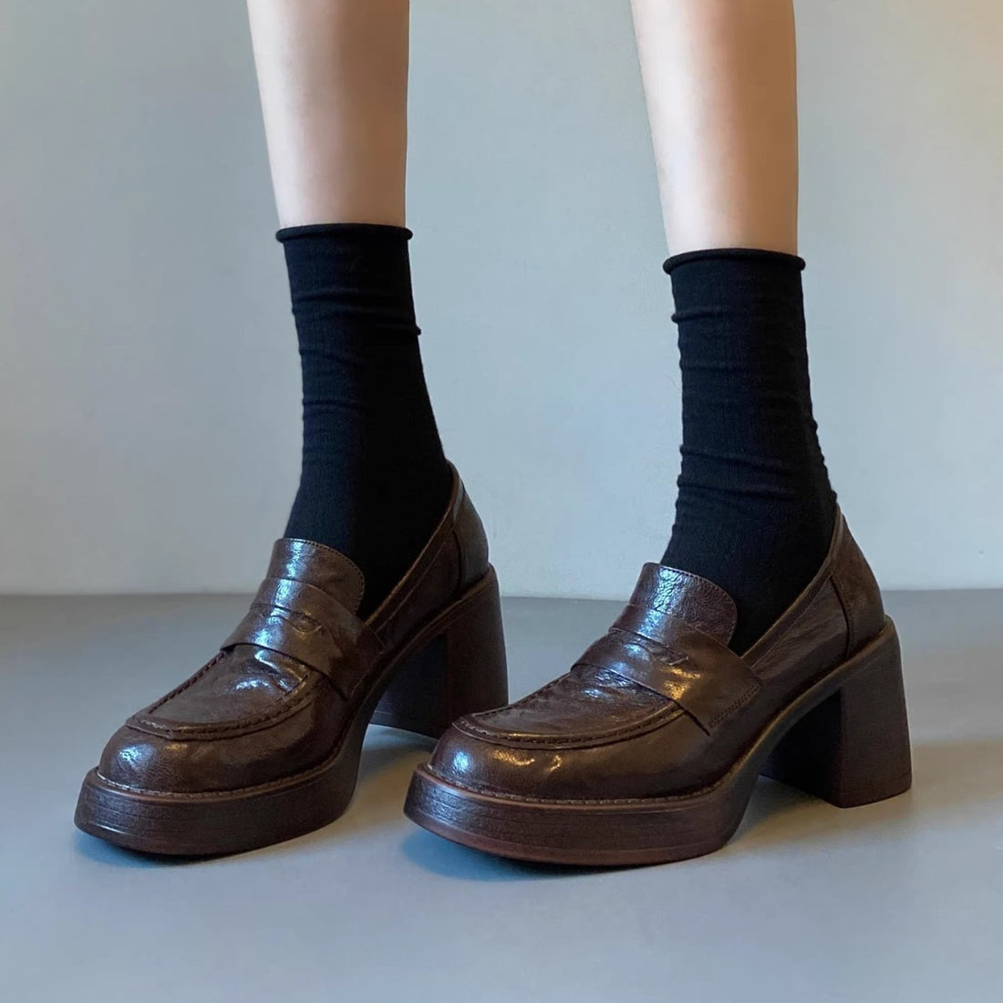 Damen Hochabsatz-Pennyloafer mit massivem Blockabsatz und profilierter Sohle Echo Archiv