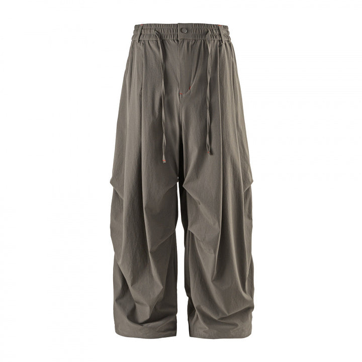 Unisex Weitgeschnittene technische Cargo-Hose mit Gummibund, Kordelzug und Reißverschlusstaschen Echo Archiv