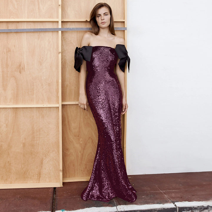 Damen Elegantes Pailletten-Maxikleid mit schulterfreiem Design und dekorativen Schleifen Echo Archiv