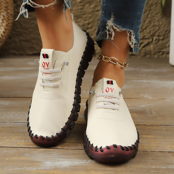 Damen Bequeme Lederoptik-Slipper mit flexibler Profilsohle und Mokassin-Naht – Lioré