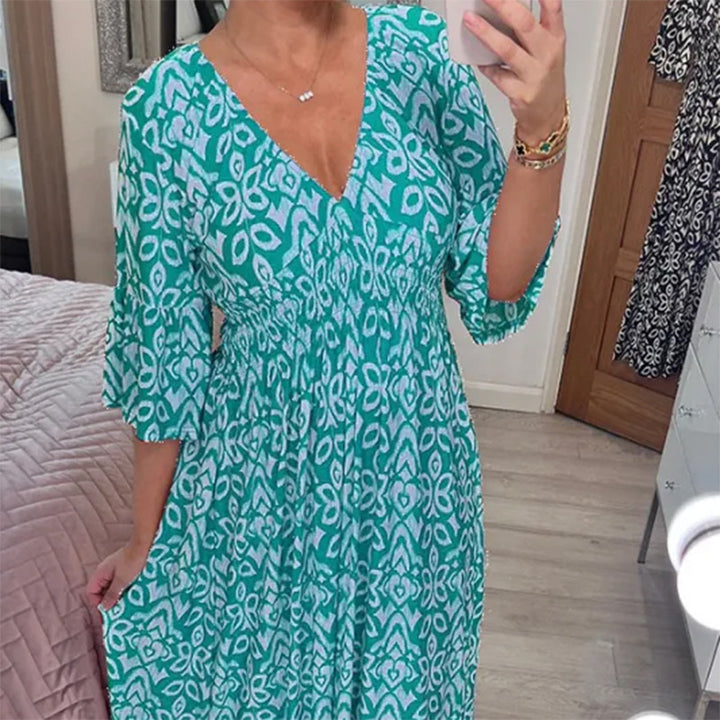 Damen Maxikleid mit V-Ausschnitt, gerafftem Taillenteil und Rüschendreiviertelärmeln – Valéora