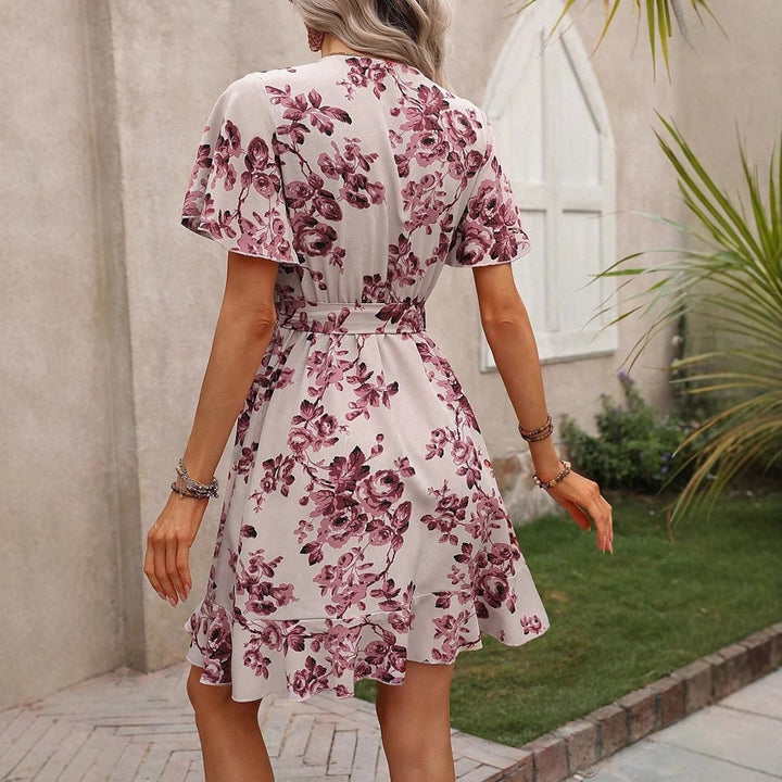 Damen Wickelkleid mit voluminösen Ärmeln und asymmetrischem Saum Echo Archiv