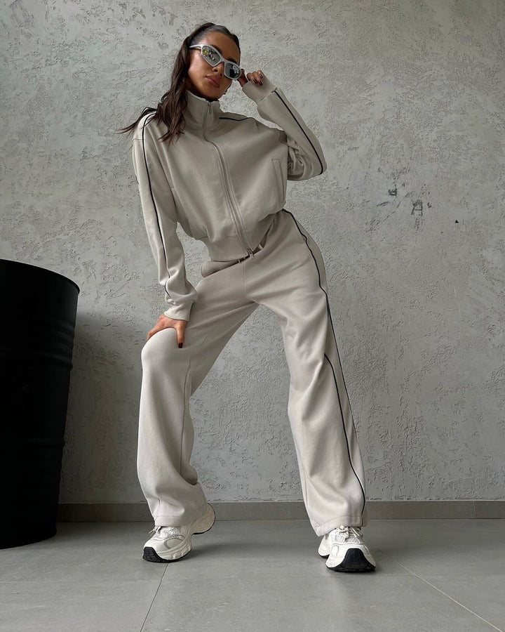 Damen lässiges Sweatset mit Stehkragen Reißverschluss gekürzter Jacke und hochtaillierter Schlaghose – Avérine