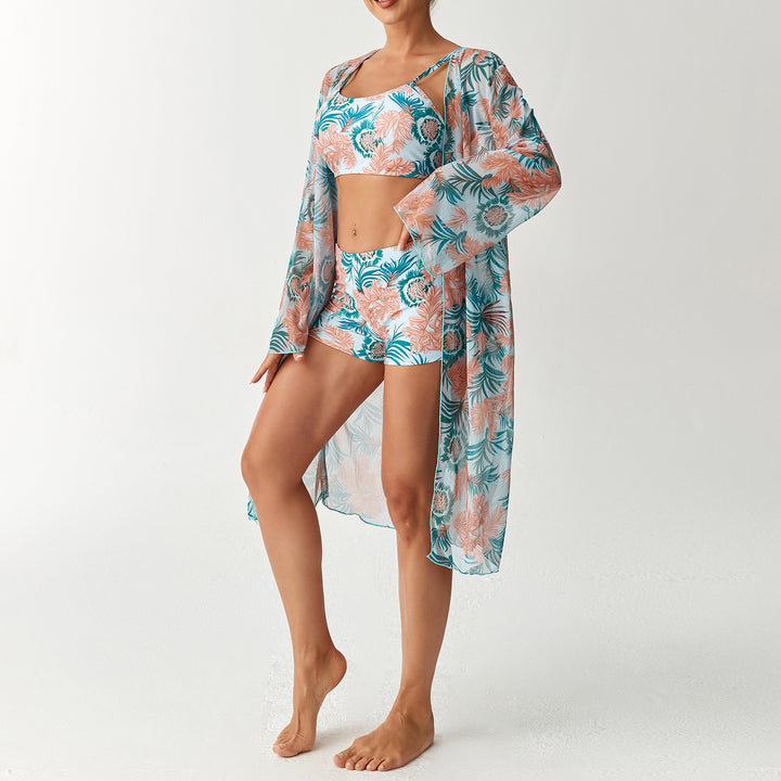 Damen Strandoutfit mit floralem Design und transparentem Kaftan Echo Archiv