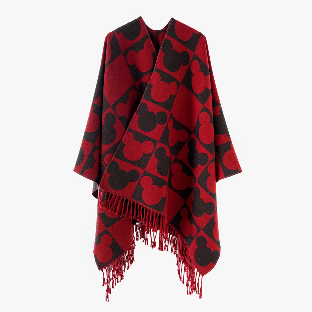 Damen Oversize-Jacquardponcho mit grafischem Kopf-Silhouettenmuster und Fransen – Avérine