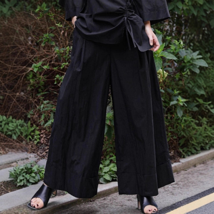 Damen Weite Palazzo-Hose mit hohem Bund und breitem Saum Echoarchiv