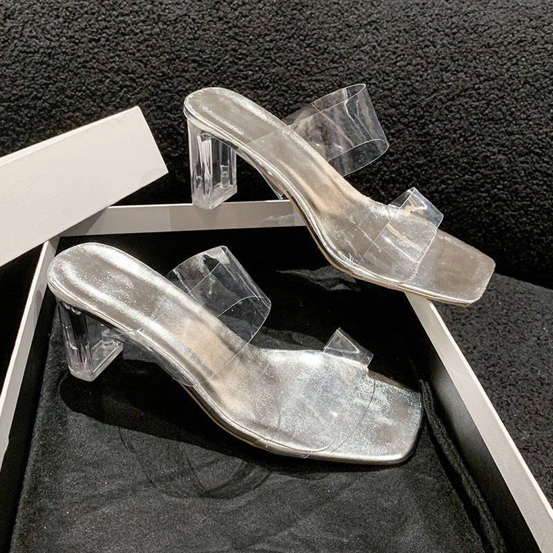Damen Transparente PVC‑Mules mit klarem Blockabsatz und metallischem Fußbett – Avérine