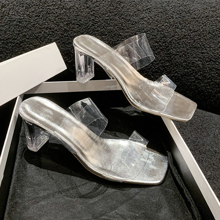 Damen Transparente PVC‑Mules mit klarem Blockabsatz und metallischem Fußbett – Avérine