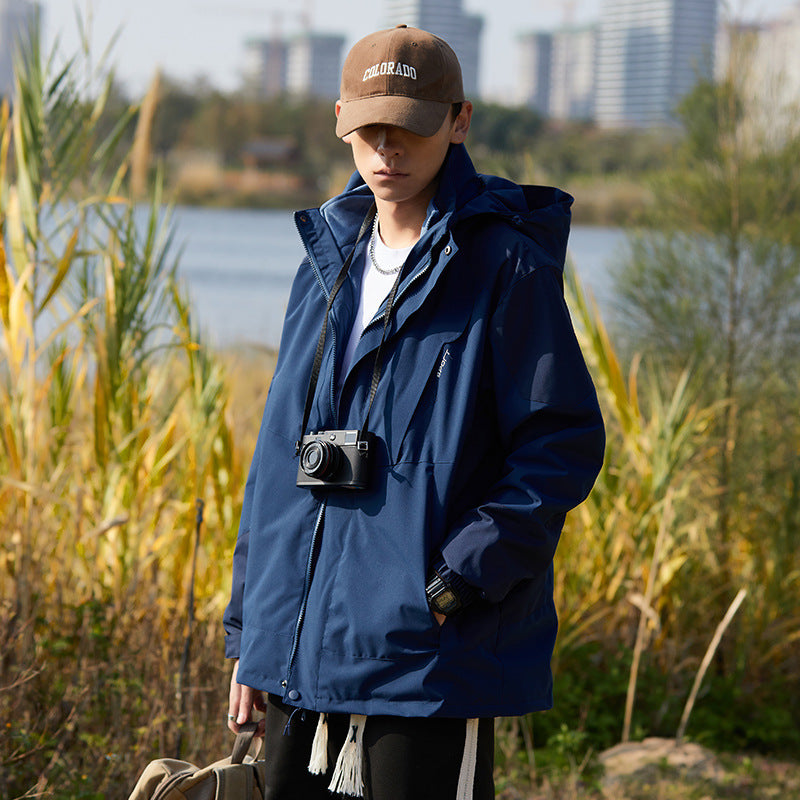 Damen zweilagige wasserabweisende Outdoorjacke mit Kapuze, Taillenregulierung und Kontrastbesätzen Echoarchiv