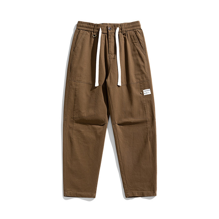 Herren Locker geschnittene Cargo-Jogginghose mit Tunnelzug, Knieabnähern und Utility‑Details Echo Archiv