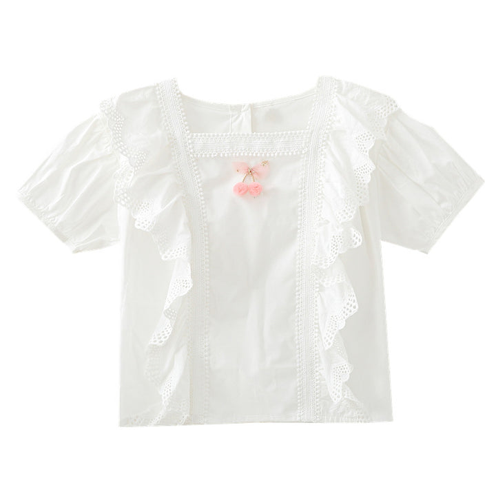 Mädchen Bluse mit verspieltem Rüschendesign und kunstvoller Häkelverzierung Echo Archiv