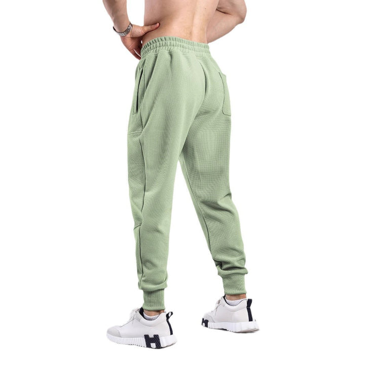Herren Sportliche Jogginghose mit atmungsaktiven Einsätzen und elastischem Bund Echoarchiv