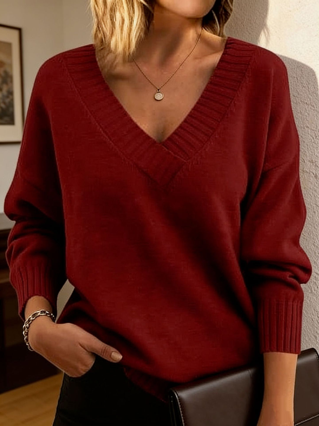 Damen Feinstrickpullover mit tiefem V-Ausschnitt und überschnittener Schulter – Mavelle