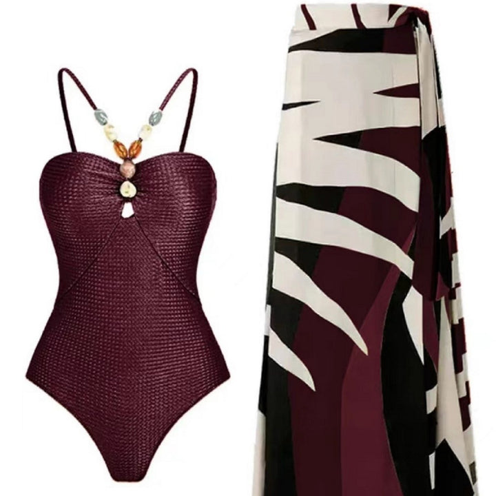Damen Badeanzug mit elegantem Wickelrock und modischen Schmuckdetails Echo Archiv