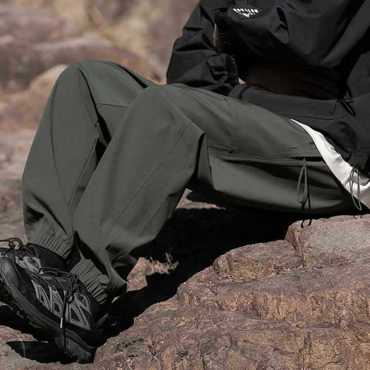 Herren Weite Relaxed-Cargo-Freizeithose mit Tunnelzugbund & Multifunktions‑Taschen Echoarchiv