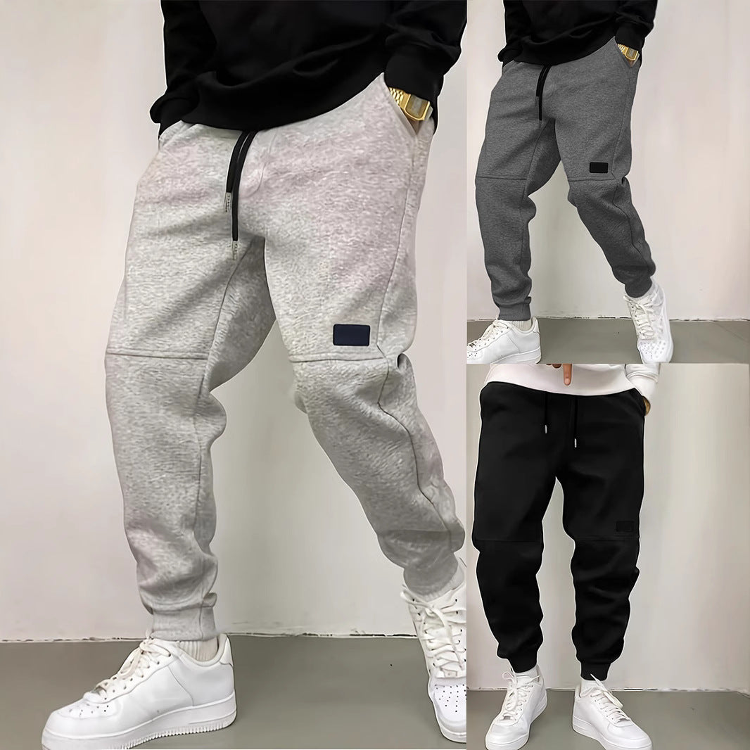 Herren Sportliche Jogginghose mit seitlichen Reißverschluss-Details Echoarchiv