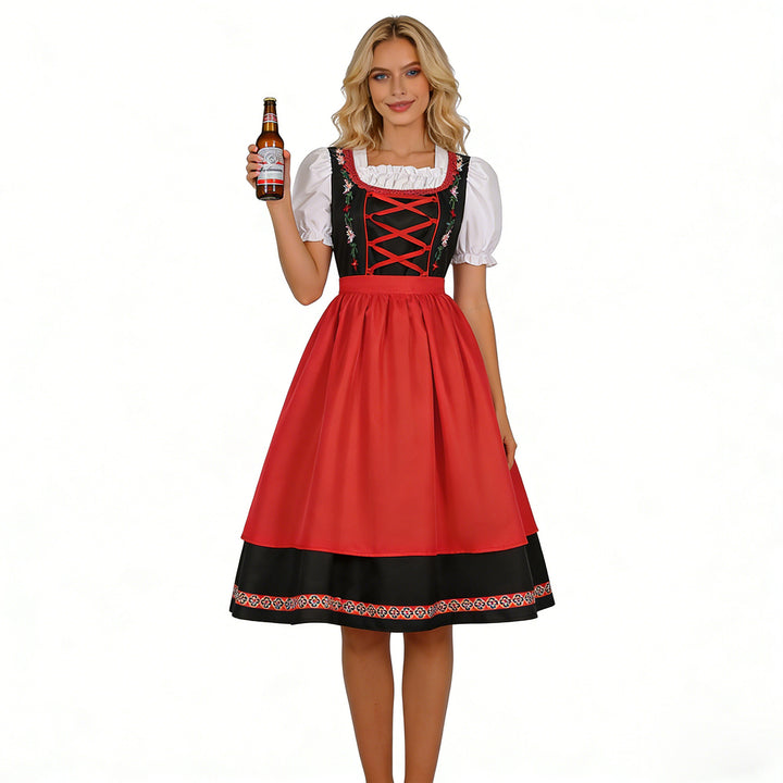 Damen nan traditionelles Dirndlkleid mit besticktem Mieder, Puffärmeln und Schürze Echo Archiv