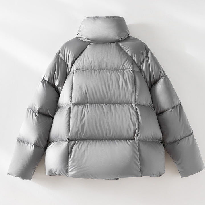 Damen Kurze Boxy-Pufferjacke mit hohem Stehkragen und Raglanärmeln Echoarchiv