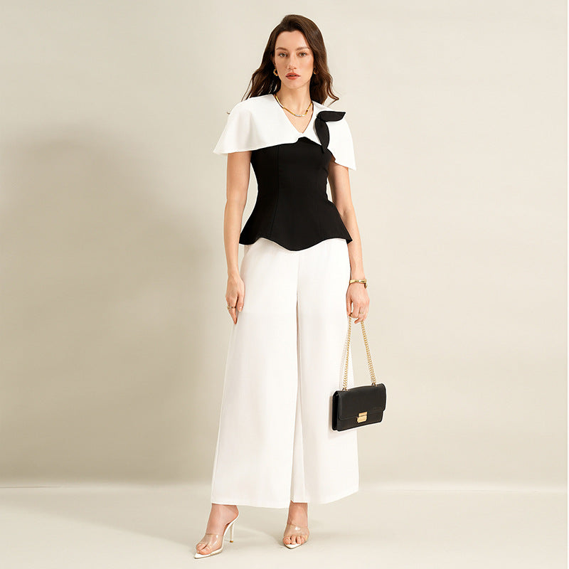 Damen Elegantes Top mit asymmetrischen Ärmeln Echo Archiv