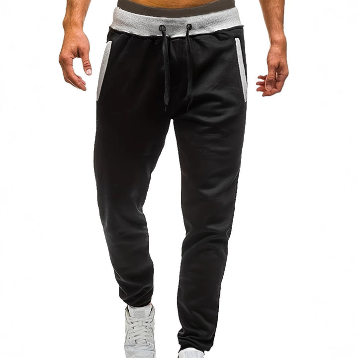 Herren Sportliche Jogginghose mit eingearbeiteten Seitentaschen und verstellbarem Kordelzug Echoarchiv